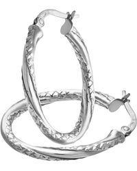 DIAMANT L'ÉTERNEL - 9ct Witgouden Ovale Oorringen Met Gedraaid Diamantgeslepen Ontwerp - Lyst