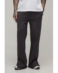 BoohooMAN - Tall Baggy Flared Fit Split Hem Joggers - Lyst