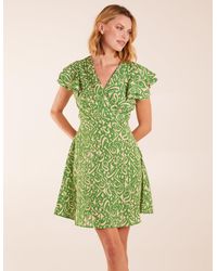 Blue Vanilla - Aztec Wrap Ruffle Frill Sleeve Mini Dress - Lyst