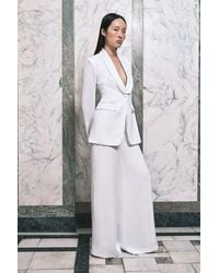 Karen Millen - Satin Viscose Tailored Kick Flare Trouser - Lyst