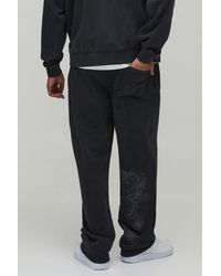 BoohooMAN - Baggy Fit Ofclman Applique Dragon Washed Joggers - Lyst