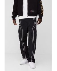 BoohooMAN - Elasticated Waist Relaxed Nylon Pipped Cargo Trousers - Lyst