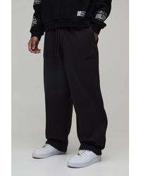 BoohooMAN - Balloon Fit Embroidered Washed Jogger - Lyst