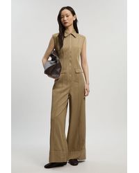Karen Millen - Tencel Cotton Contrast Stitch Zip Front Woven Jumpsuit - Lyst