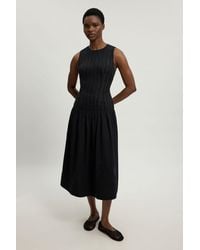 Karen Millen - Petite Textured Drop Waist Long Sleeve Woven Midi Dress - Lyst