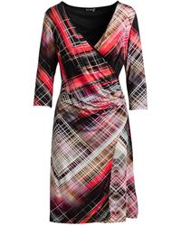 Conquista - Print Jersey Faux Wrap Dress - Lyst