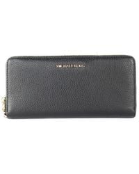 Michael Kors - Jet Set Travel Large Pebble Leather Continental Wrist Wallet - Lyst