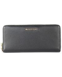 Michael Kors - Jet Set Travel Large Pebble Leather Continental Wrist Wallet - Lyst