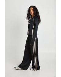 Boohoo - Side Stripe Tricot Adjustable Cuff Wide Leg Jogger - Lyst