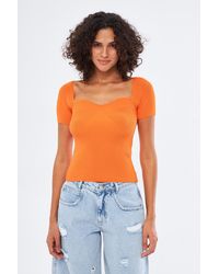 Kutaf - Gebreid T-shirt Met Korte Mouwen - Lyst