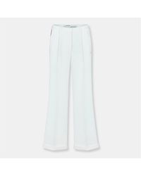 Off-White c/o Virgil Abloh - Off Solid Patterned Flared Trousers - Lyst