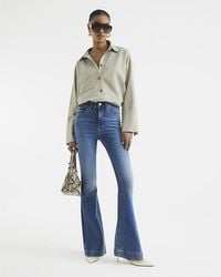 River Island - Flared Jeans High Waisted Tummy Hold Denim Cotton - Lyst