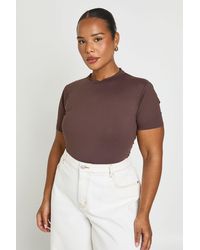 Boohoo - Plus Second Skin Short Sleeve High Neck Bodysuit - Lyst