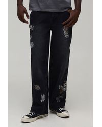 BoohooMAN - Mono Floral Relaxed Fit Jeans - Lyst