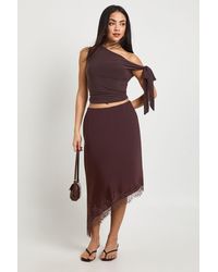 Boohoo - Lace Asymmetric Hem Satin Midi Skirt - Lyst