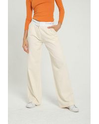 Hiccup - High Waist Pleated Trousers With A Belt Detail - Lyst