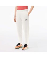 Lacoste - Dames Sweatpants Met Geborduurde Rechte Pijpen In Crème - Lyst