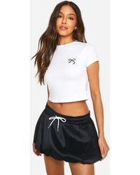 Boohoo - Drawcord Waist Puff Ball Mini Skirt - Lyst