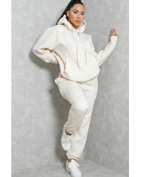 Femme Luxe - Oversized Front Pocket Pullover Hoodie Cuffed Joggers Loungewear Set - Lyst