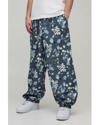BoohooMAN - Parachute Fit Floral Print Nylon Trouser - Lyst