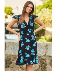 Sosandar - Floral Print Ruffle Hem Wrap Dress - Lyst