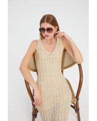 Hiccup - Knitted Striped V Neck Midi Dress With A Back Cut Out - Lyst