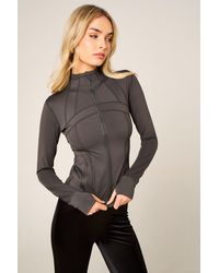 Femme Luxe - High Neck Fitted Zip Up Lightweight Jacket - Lyst