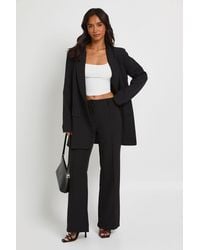 Boohoo - Petite Fit & Flare Tailored Trousers - Lyst
