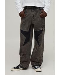 BoohooMAN - Star Patchwork Relaxed Fit Jeans - Lyst