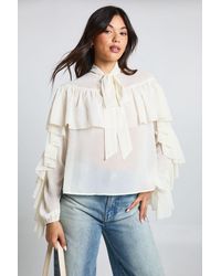 Boohoo - Ruffle Tie Detail Balloon Sleeve Blouse - Lyst