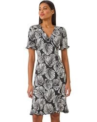 Roman - Stretch Leaf Print Side Button Dress - Lyst