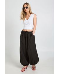 Boohoo - Petite Linen Look Tie Cuff Balloon Trousers - Lyst