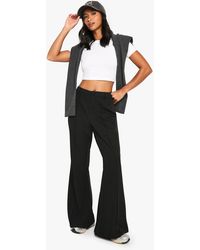 Boohoo - Petite Seam Detail Flare Leg Pants - Lyst