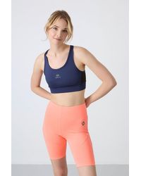 TOMMY LIFE - Fitted Sleeveless Crop Sports Top - Lyst
