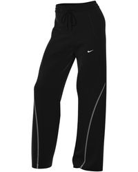 Nike - Mid-Rise Repel Zip Track Pants Nylon - Lyst