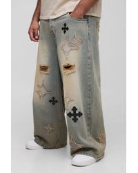 BoohooMAN - Plus Distressed Applique Tinted Baggy Fit Jeans - Lyst