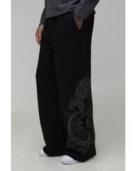 BoohooMAN - Tall Extreme Wide Leg Dragon Graphic Joggers - Lyst