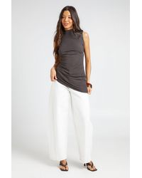 Boohoo - Super Soft Rib High Neck Ruched Asym Top - Lyst
