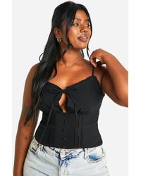 Boohoo - Plus Tie Front Seam Detail Button Corset Top - Lyst