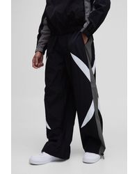 BoohooMAN - Elasticated Waist Parachute Side Stripe Pants - Lyst