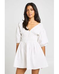 Boohoo - Cotton Poplin Shirred Bodice V Neck Puff Sleeve Mini Dress - Lyst