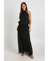 Boohoo - Chiffon Ruched Drop Waist Halter Neck Maxi Dress - Lyst