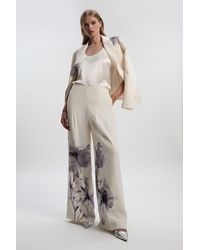 Karen Millen - Floral Placement Print Tailored Crepe Pleat Detail Wide Leg Trousers - Lyst