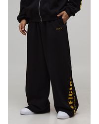 BoohooMAN - Extreme Wide Leg Official Gusset Slogan Jogger - Lyst