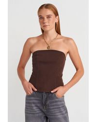 Dilvin - Strapless Fitted Peplum Blouse - Lyst