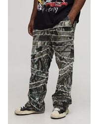 BoohooMAN - Plus Camo Print Skinny Flare Raw Edge Applique Pants - Lyst