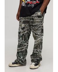 BoohooMAN - Plus Camo Print Skinny Flare Raw Edge Applique Pants - Lyst