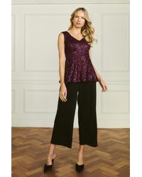 Izabel London - Sparkly Sequin Sleeveless Peplum Top - Lyst