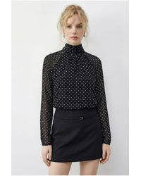 Bianco Lucci - Polka Dot Turtleneck Chiffon Blouse - Lyst