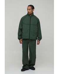 BoohooMAN - Oversized Funnel Neck Zip Through Nylon Pipe Detail Tracksuit - Lyst